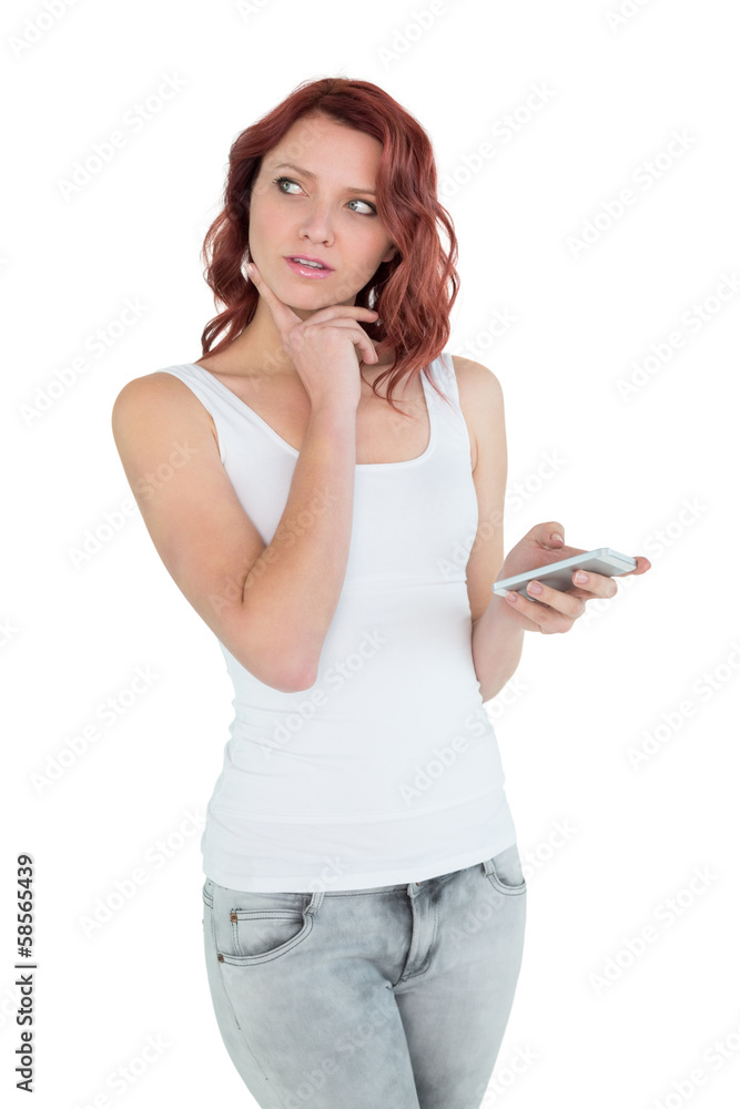 Thoughtful casual young woman with mobile phone Thoughtful casual young woman with mobile phone