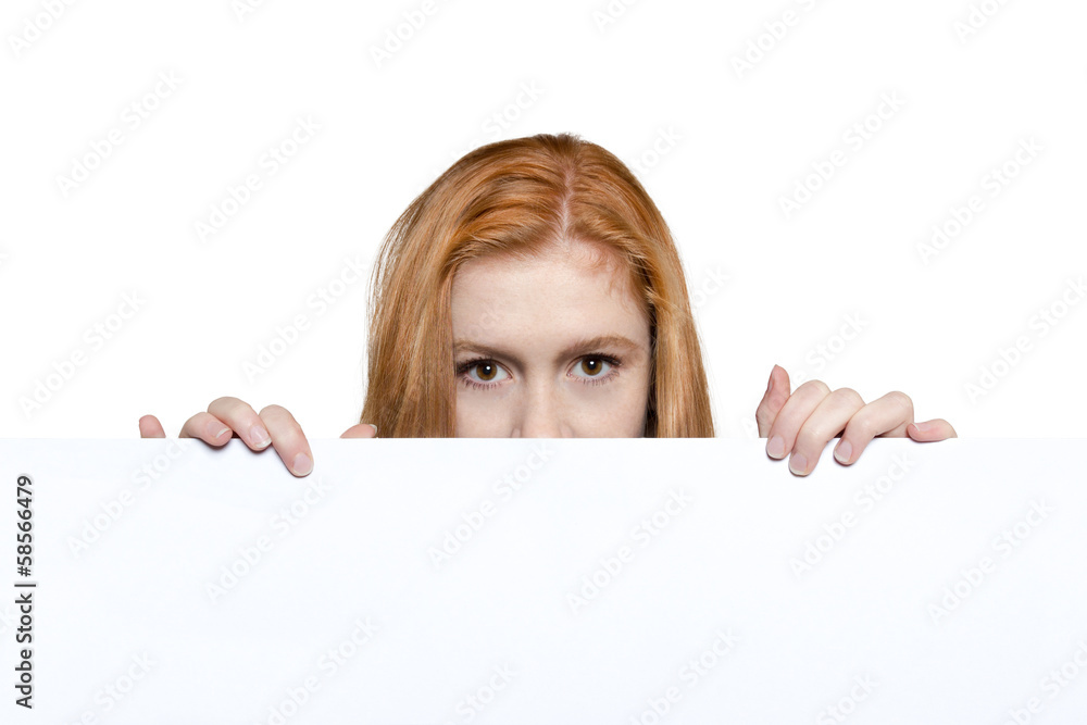 Teen girl holding a sign with copyspace for adverts Teen girl holding a sign with copyspace for adverts