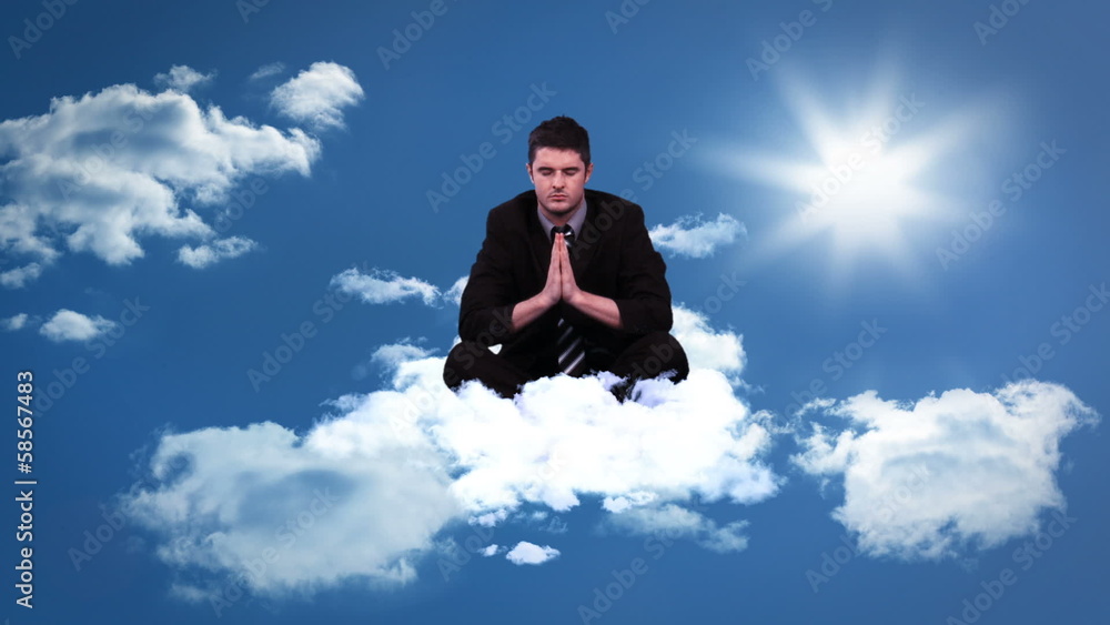 Calm meditating businessman sitting on cloud Calm meditating businessman sitting on cloud