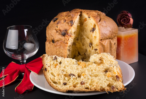 Delicious panettone, Christmas cake with glass of wine