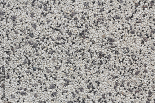 Abstract background paving consisting of small pebbles embedded