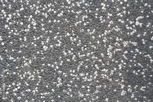Abstract background paving consisting of small pebbles embedded