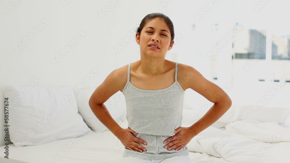 Attractive woman suffering from belly pain Attractive woman suffering from belly pain