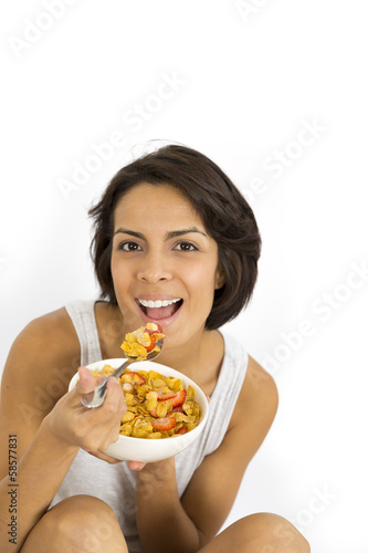 Attractive woman having breakfast