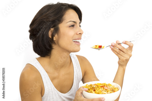 Attractive woman having breakfast