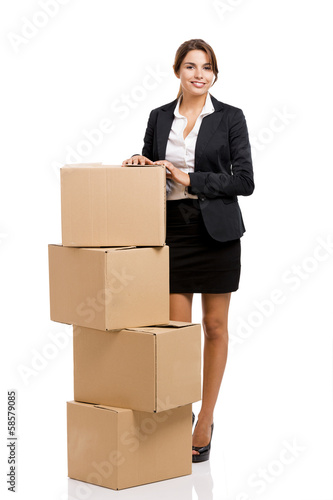 Business woman with card boxes © ikostudio
