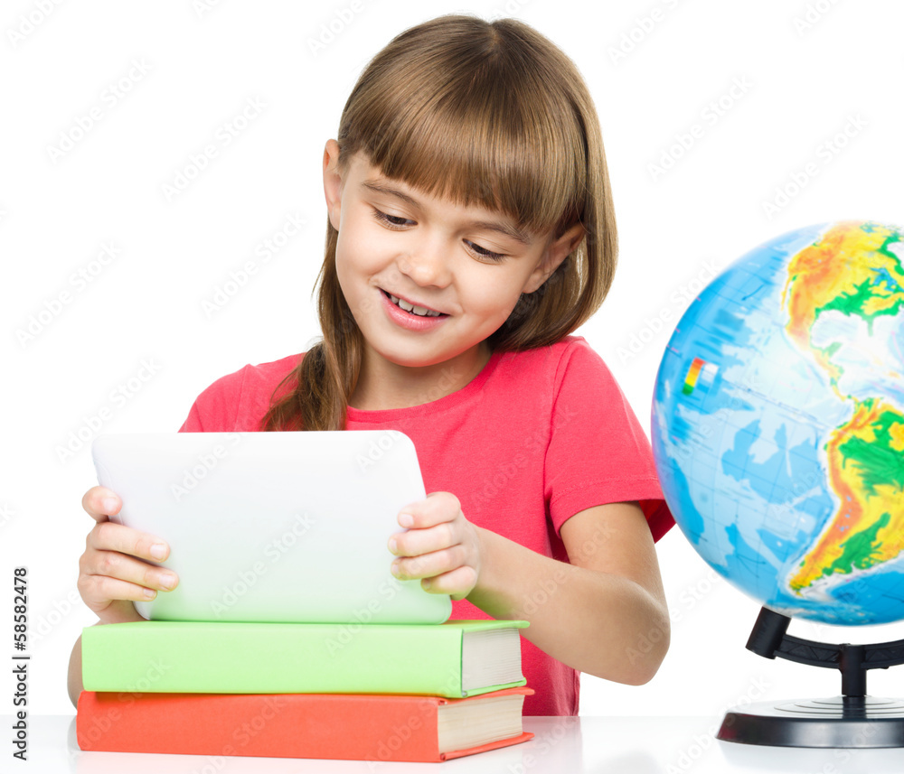 Young girl is using tablet Young girl is using tablet