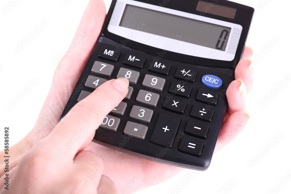 Female hands holding digital calculator isolated on white Female hands holding digital calculator isolated on white