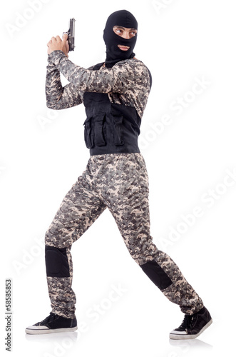Soldier in camouflage with gun on white © Elnur