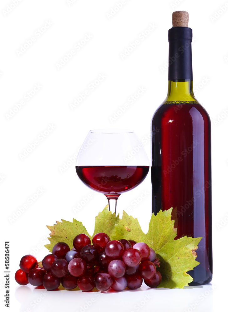 Wineglass with red wine, grape and bottle isolated on white