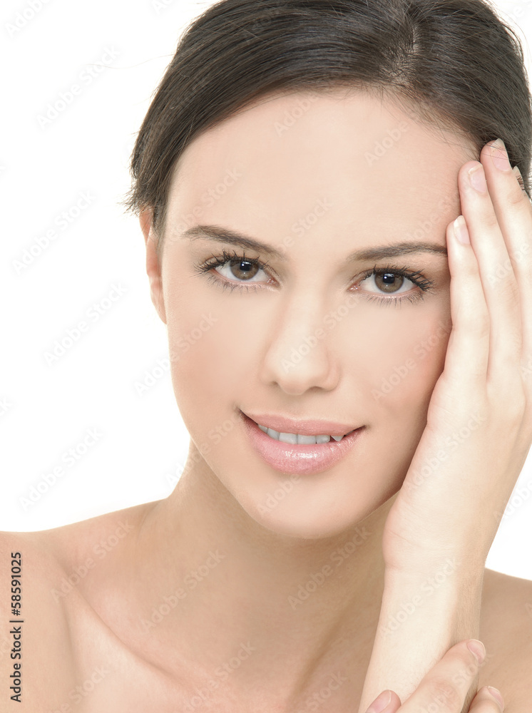 Portrait of young beautiful woman with healthy skin