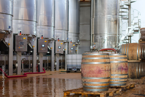 Wine manufacturing. Modern winery tanks. photo