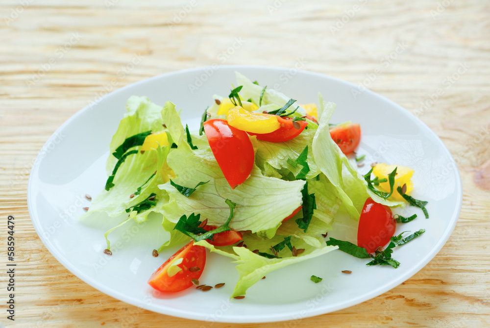 Fresh vegetable salad with iceberg lettuce
