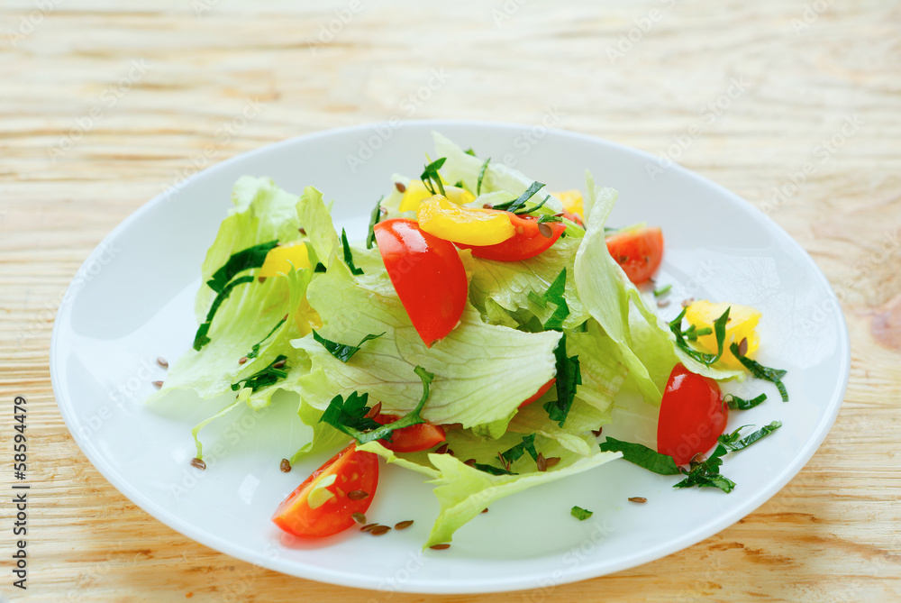 Fresh vegetable salad with iceberg lettuce Fresh vegetable salad with iceberg lettuce