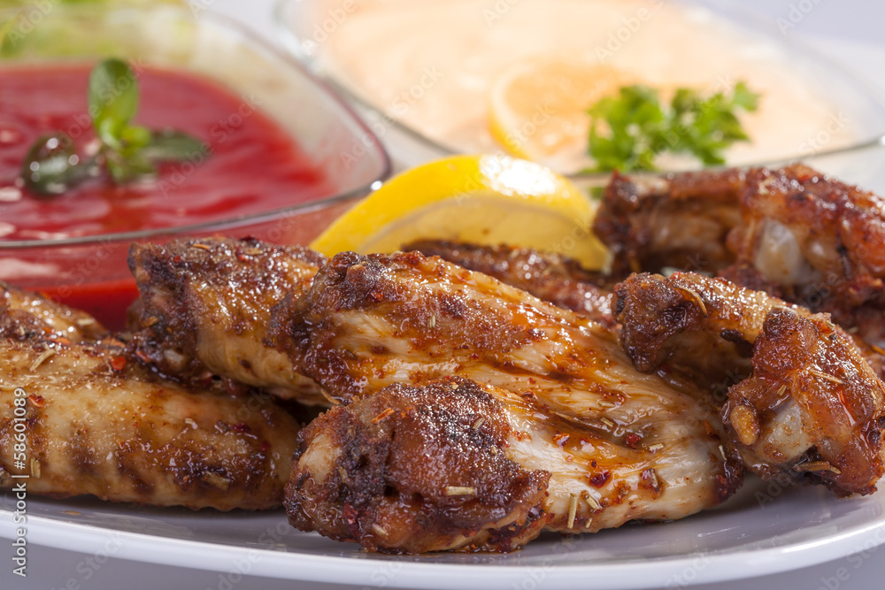 fried chicken wings in sauce with mayonnaise and tomato sauce fried chicken wings in sauce with mayonnaise and tomato sauce