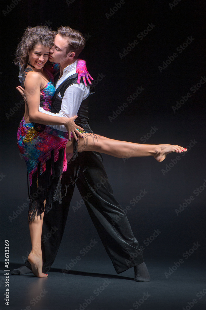 Fototapeta premium Young couple dancing