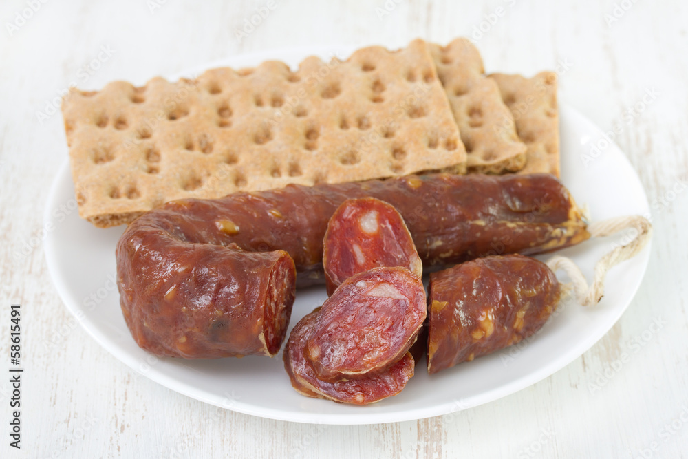 sausage with toasts on plate sausage with toasts on plate