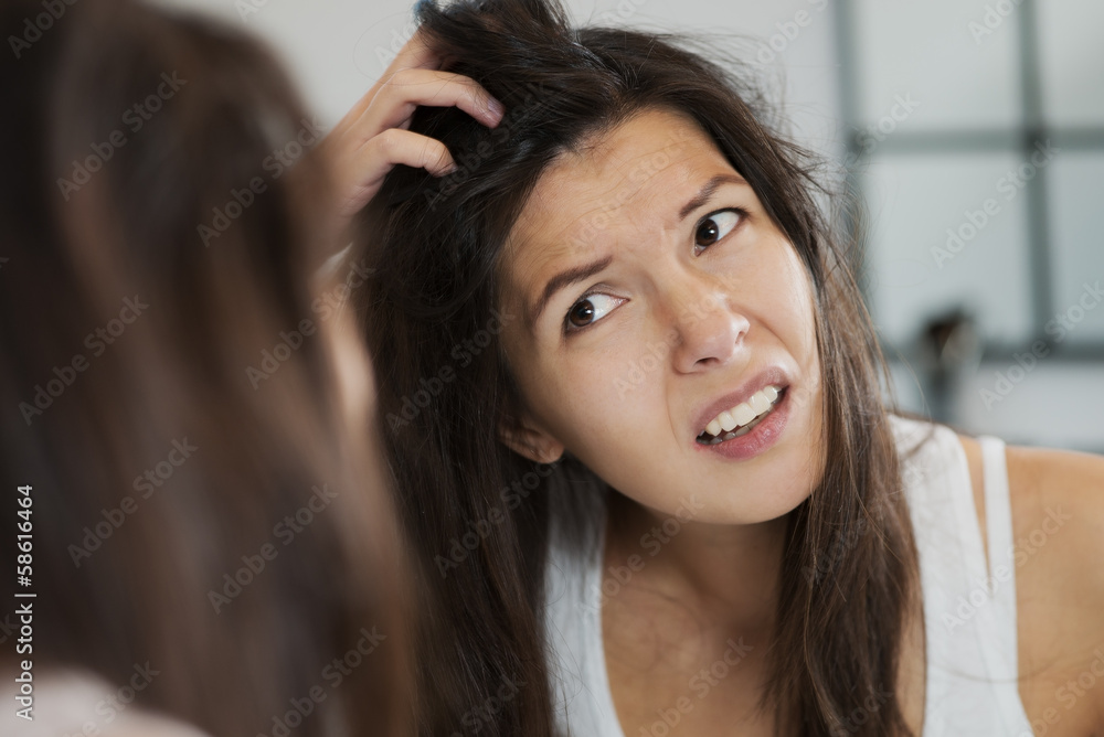 Woman having a bad hair day Woman having a bad hair day