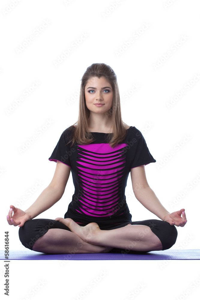 Image of attractive woman posing in lotus position Image of attractive woman posing in lotus position