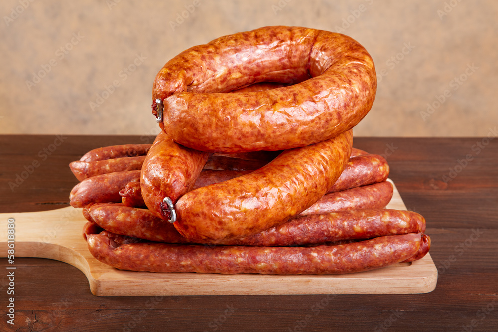 Smoked sausage on a kitchen table Smoked sausage on a kitchen table