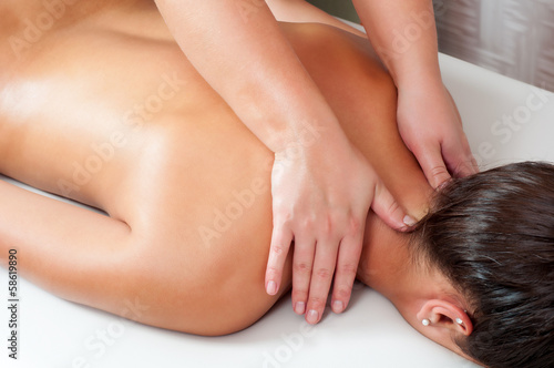 Young women getting back massage