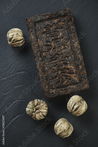 Compressed tea block and tea balls, view from above photo