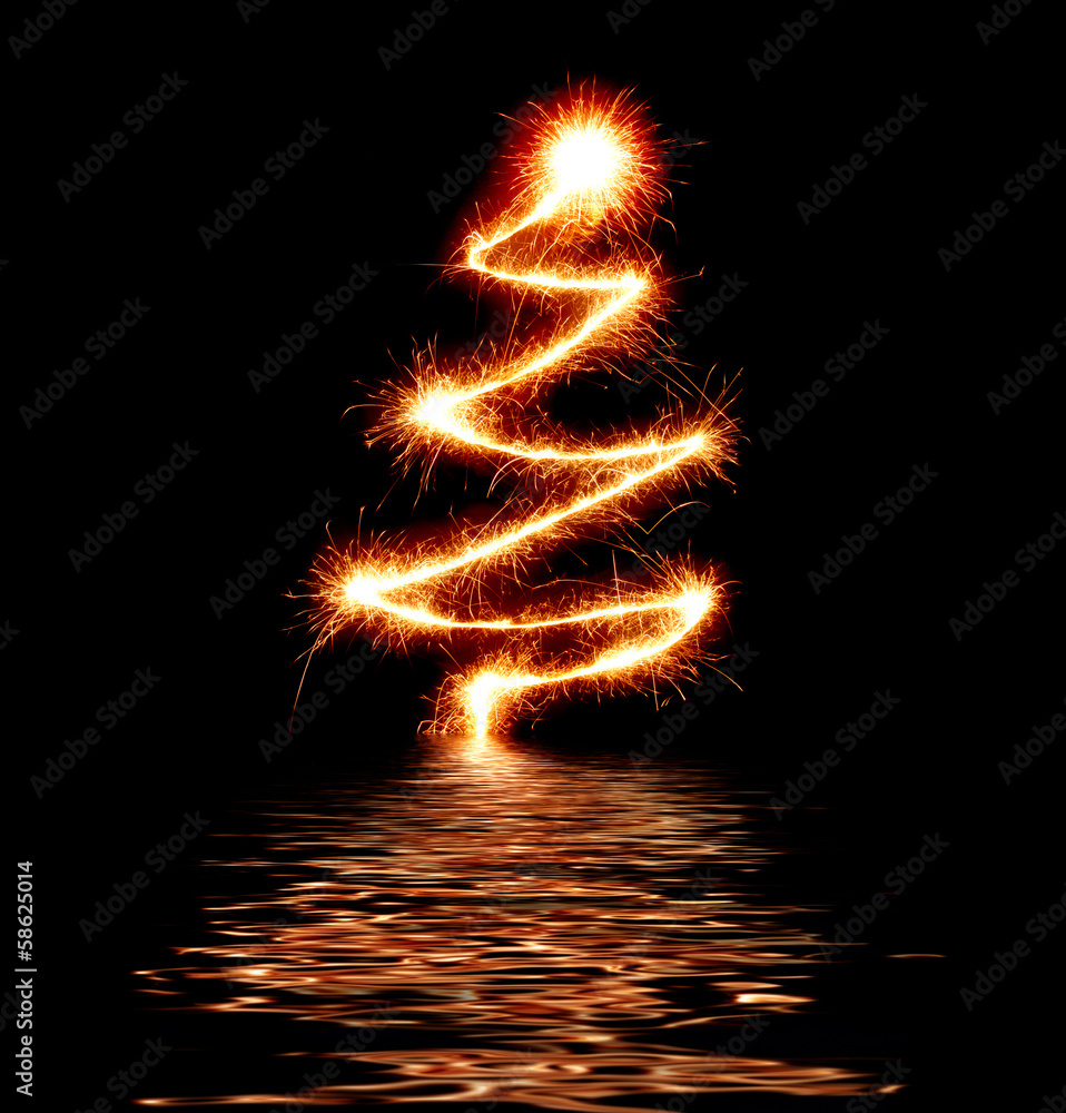 Obraz premium Sparkling Christmas Tree symbol reflecting in water