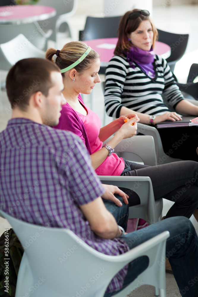 Group of college/university students during a brake Group of college/university students during a brake