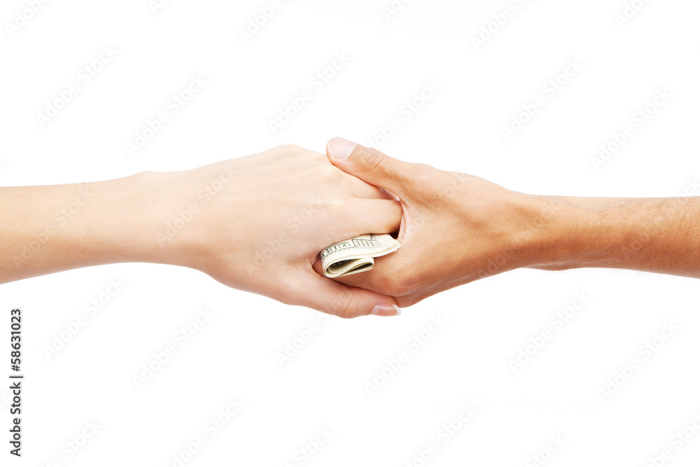 Male hand passing a 100 dollar bill Male hand passing a 100 dollar bill