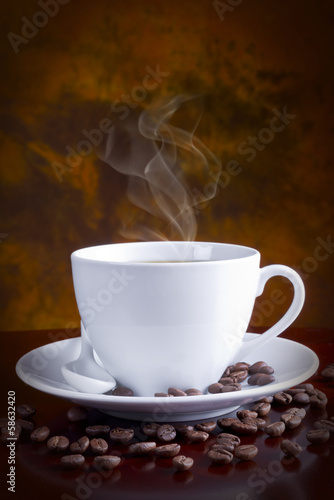 White coffee cup on black background