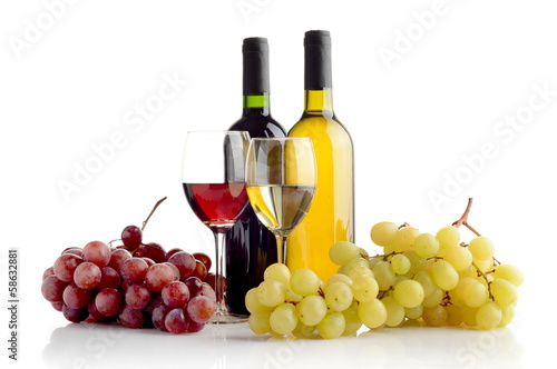 Wine and grapes isolated on white