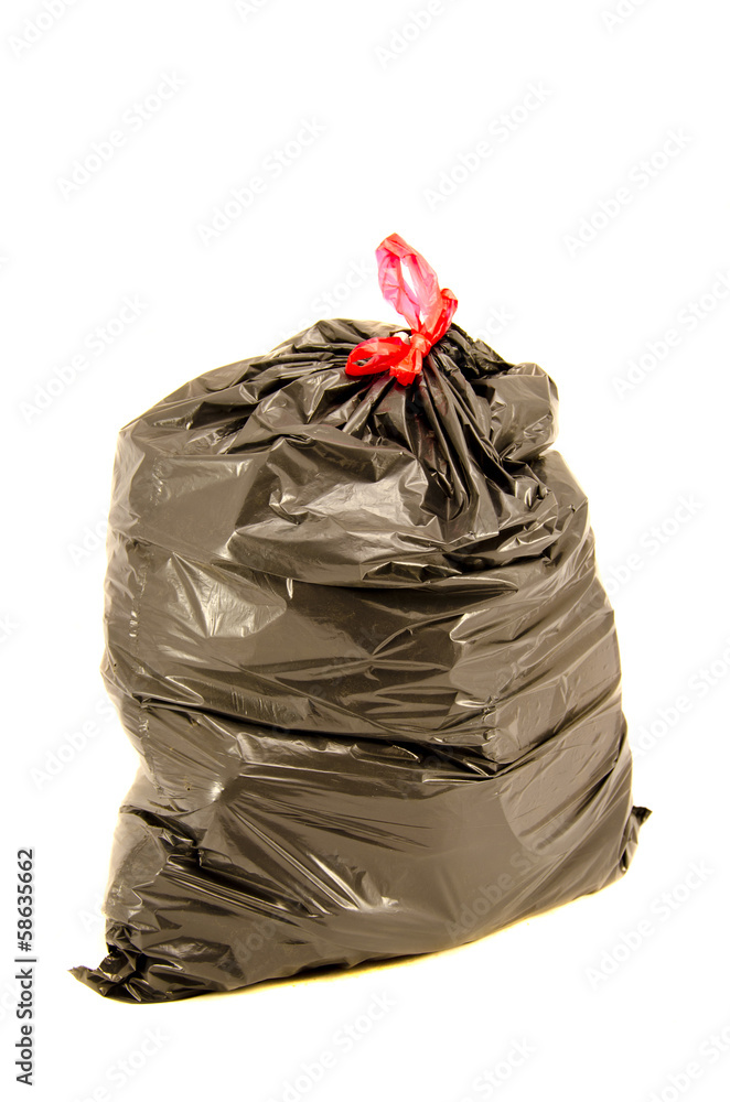isolated full black garbage bag in white background