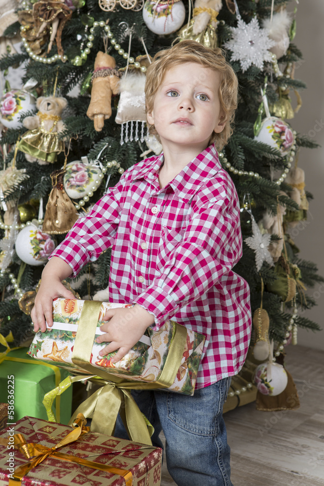 Young boy with Christmas gift
