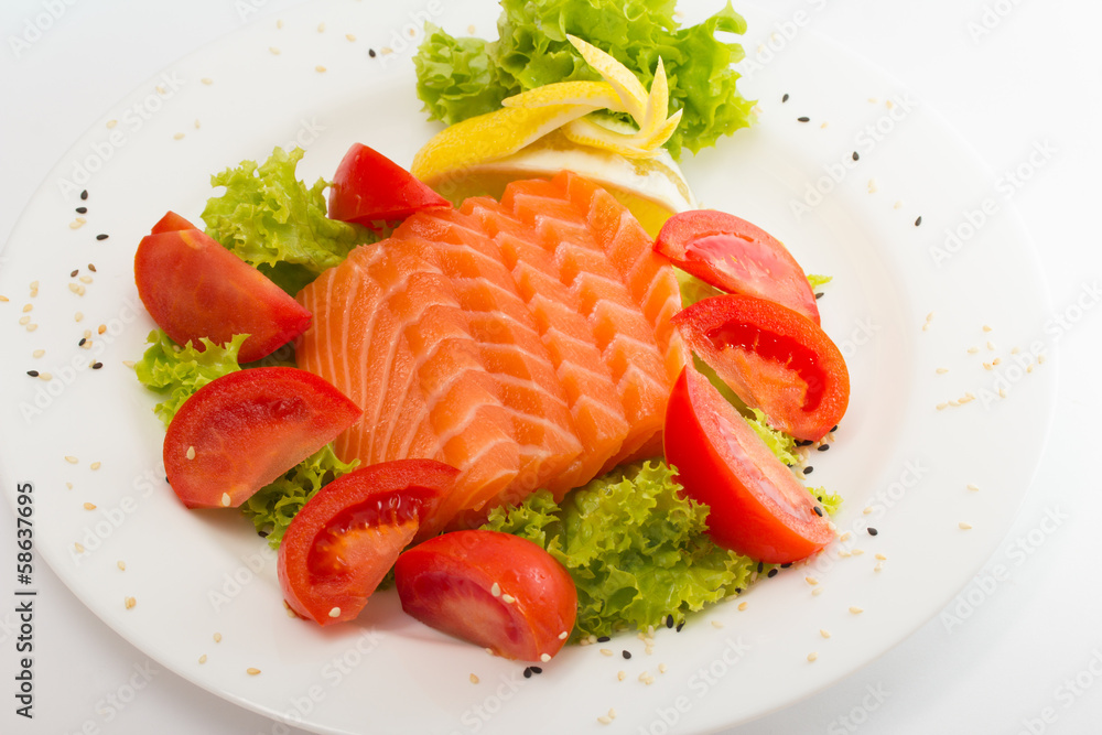 Raw salmon fillet with vegetables Raw salmon fillet with vegetables
