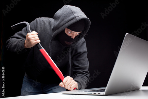Computer hacker in a balaclava