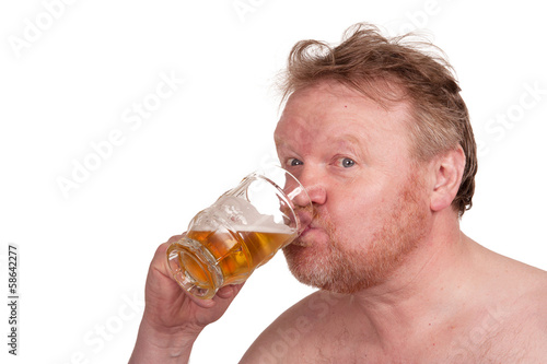 Overweight middle aged man with drinking beer