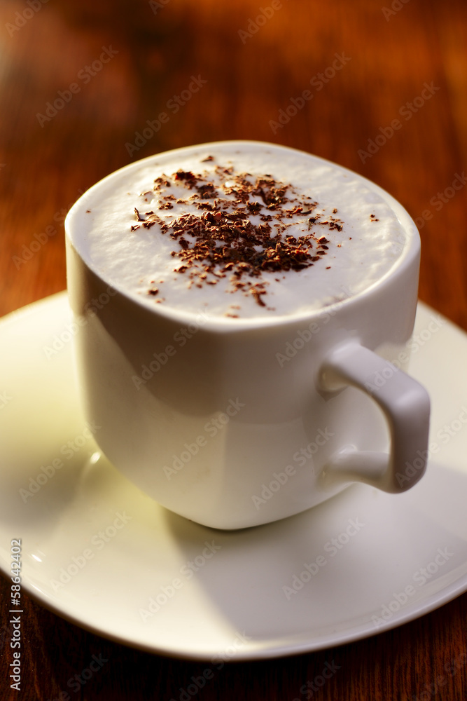 Sweet coffee with cream and chocolate flakes Sweet coffee with cream and chocolate flakes
