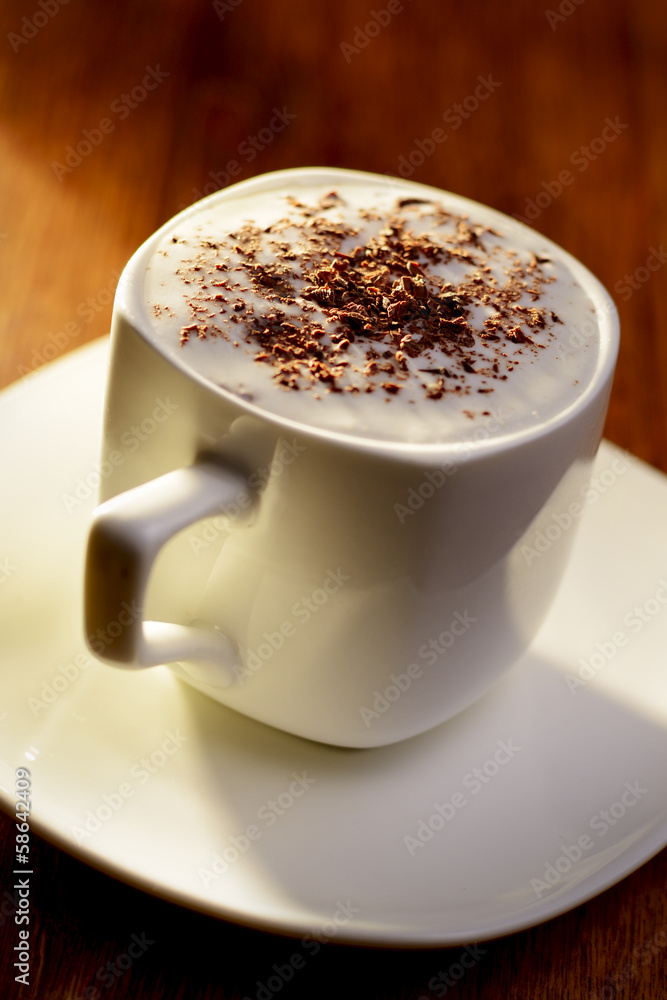 Sweet coffee with cream and chocolate flakes Sweet coffee with cream and chocolate flakes