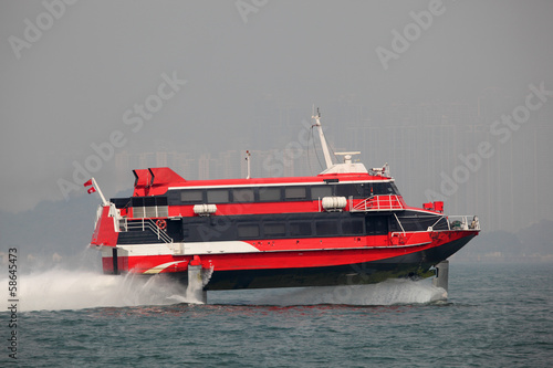 Tableau sur toile High speed hydrofoil ferry boat in Hong Kong, China