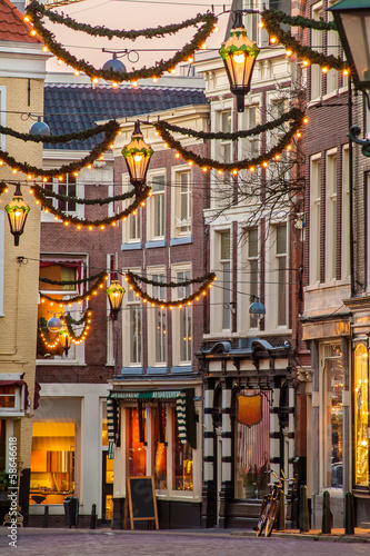 Bilde på lerret Dutch shopping street with Christmas decoration in The Hague