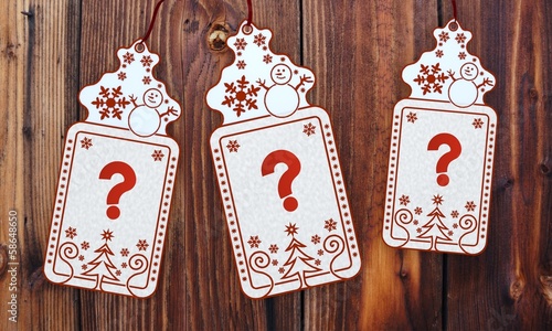 three christmas cards with question sticker