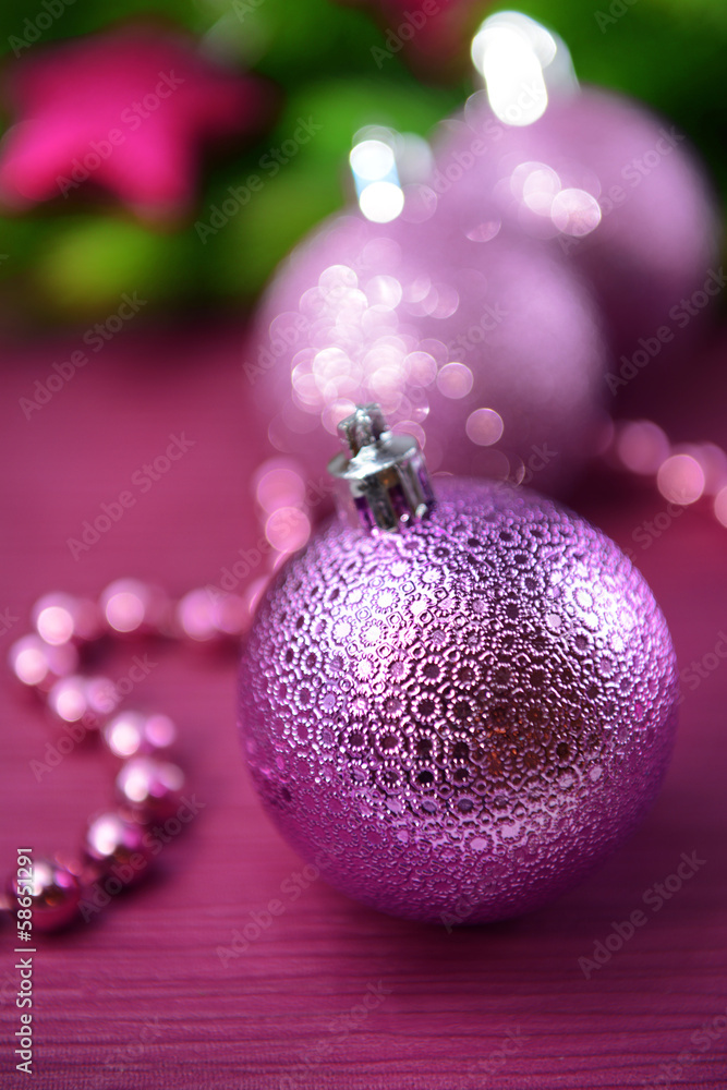 Christmas balls on fir tree, on color background Christmas balls on fir tree, on color background
