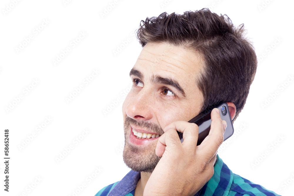 Handsome latin man talking on cell phone, isolated on a white ba Handsome latin man talking on cell phone, isolated on a white ba