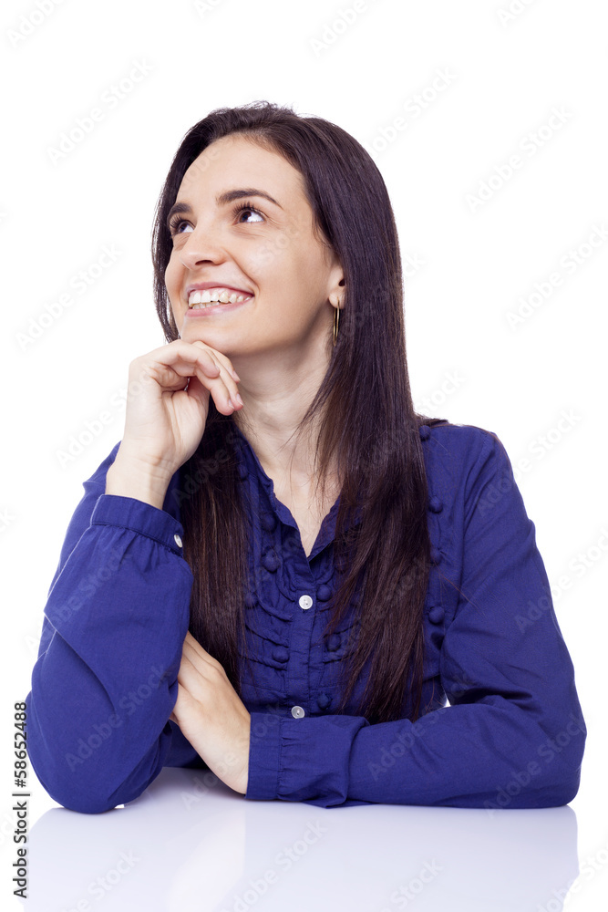 Thoughtful young beautiful woman looking up, isolated over a whi Thoughtful young beautiful woman looking up, isolated over a whi
