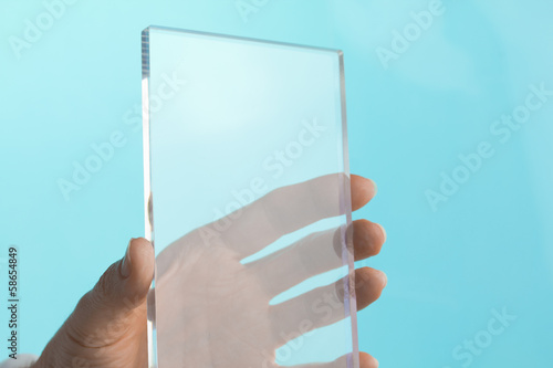 Transparent Blank Future Mini Computer Tablet Phone in Hand photo