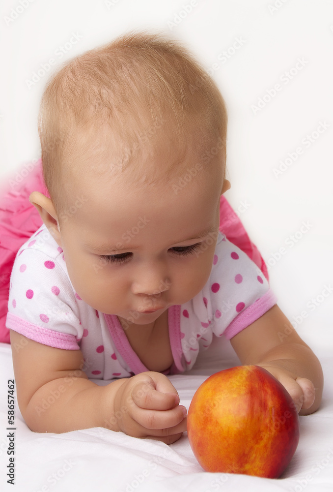 Cute baby with peach Cute baby with peach