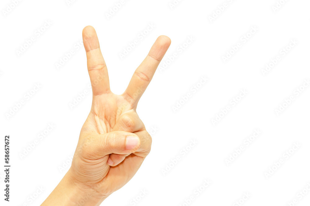Woman's hand with two fingers up isolated on white background Woman's hand with two fingers up isolated on white background
