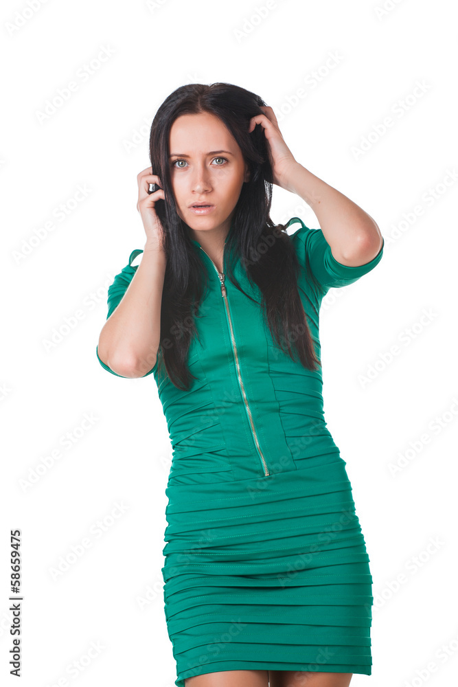 Young girl wearing green dress posing in studio Young girl wearing green dress posing in studio
