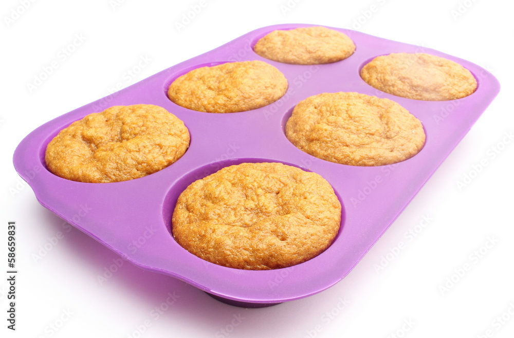Fresh baked carrot muffins in silicone mold Fresh baked carrot muffins in silicone mold