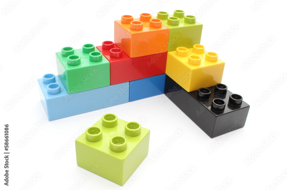 Colorful building blocks on white background Colorful building blocks on white background